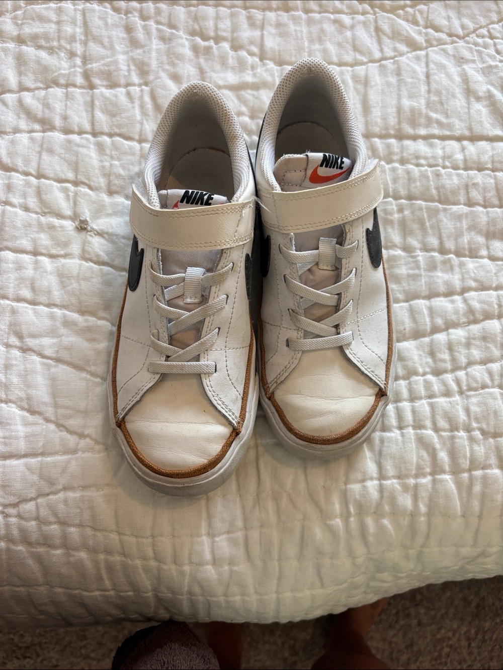 Nike Kids White Sneakers with Black Swoosh and Brown Trim